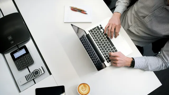 Executive studying declining performance charts on a tablet